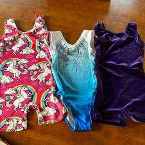 3 gymnastic leotards